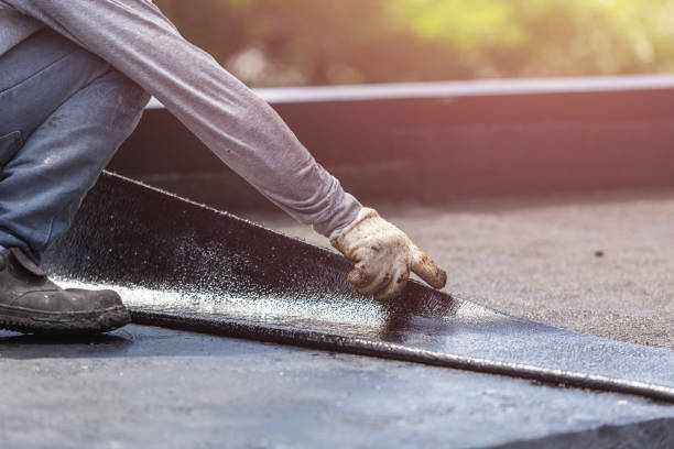 Professional Emergency Waterproofing technician working in Oak Park, IL